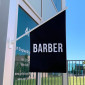 Wall mounted barber flag sign
